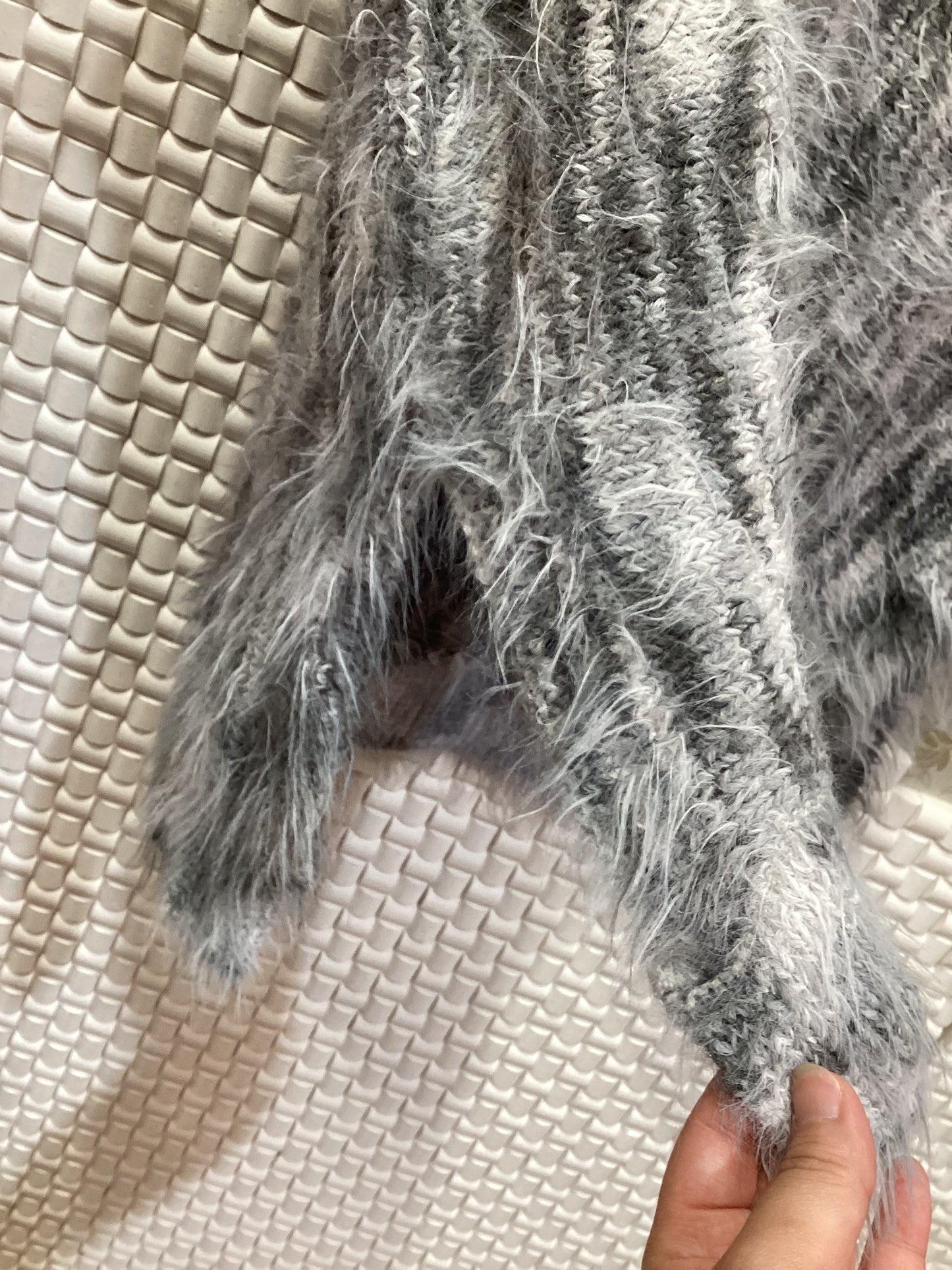 ◯フェザーニットベスト