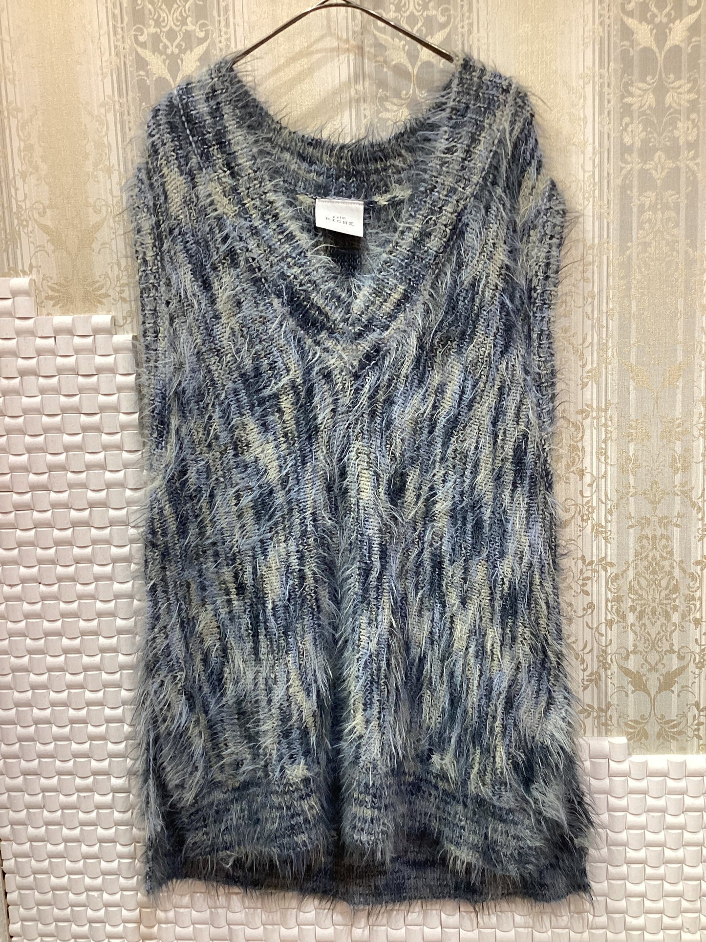 ◯フェザーニットベスト
