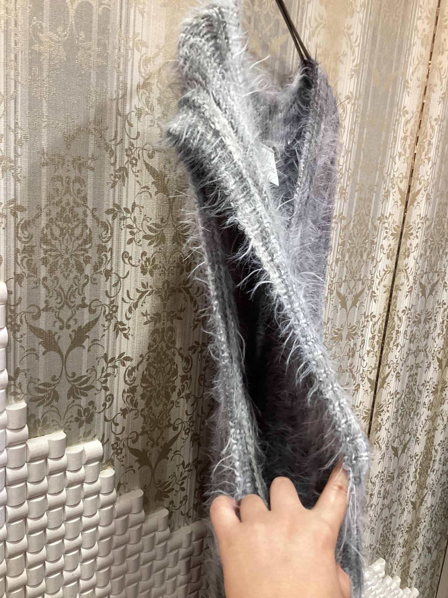 ◯フェザーニットベスト