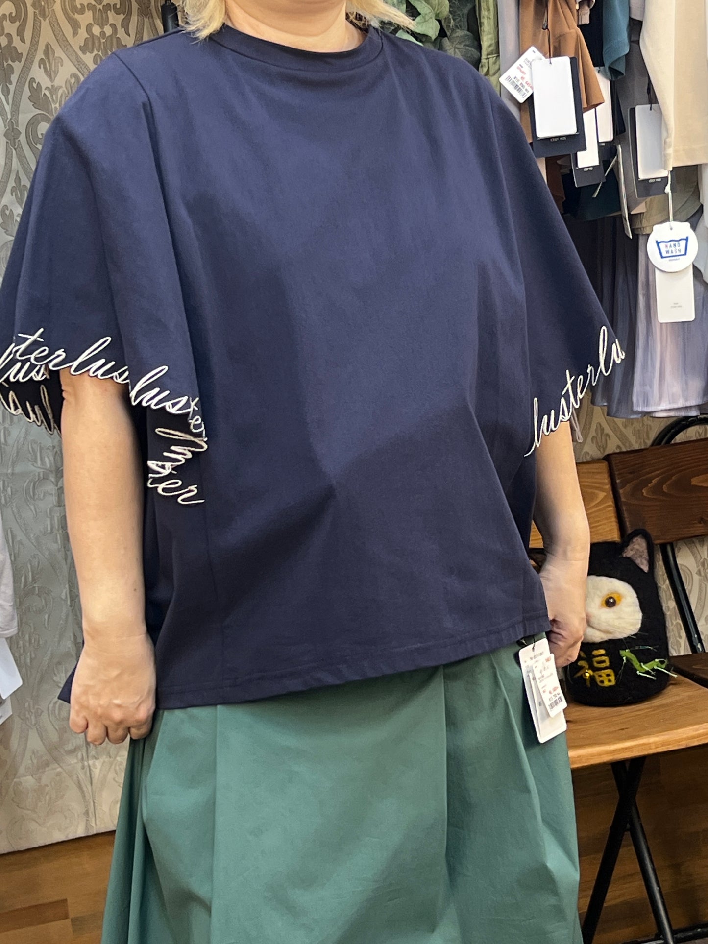 スカラップ刺繍フレアスリーブトップス